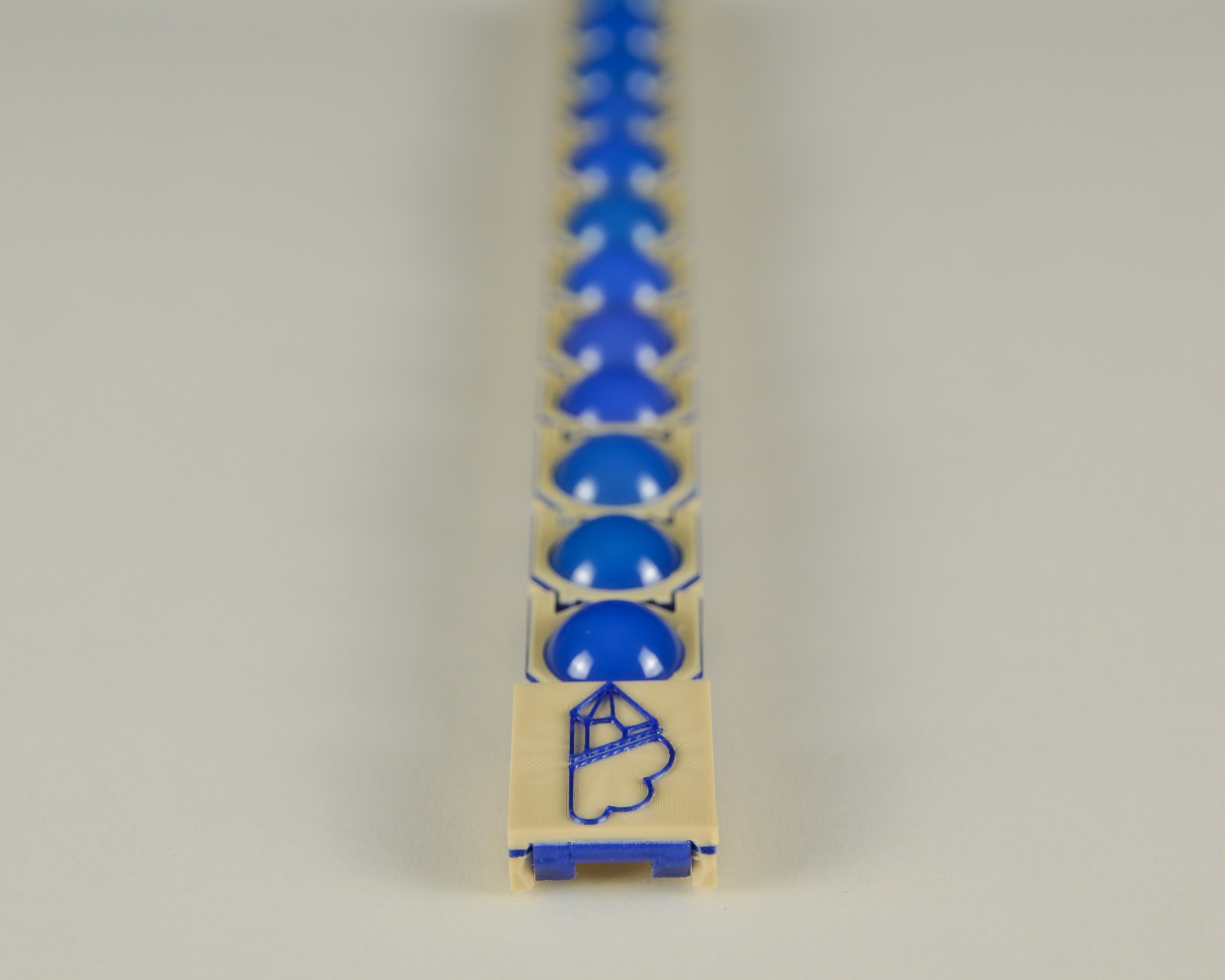 Blue agate bracelet in blue and tan, straight layout