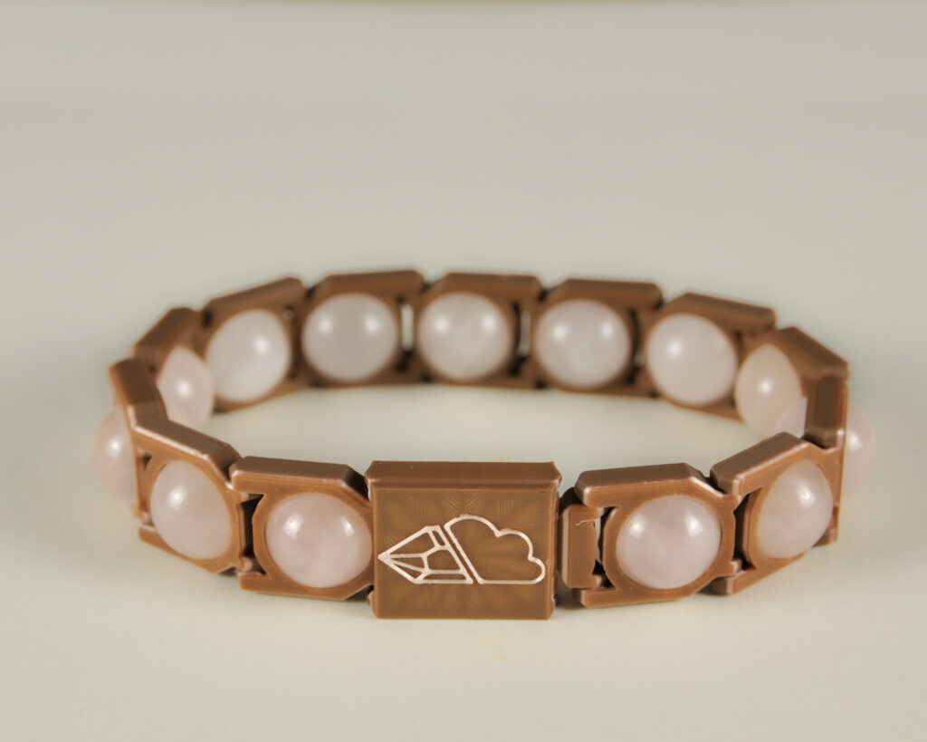 Rose quartz sphere bracelet in pink and brown, front view